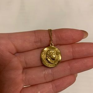 gold necklace with pendant